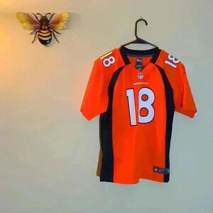 Denver Broncos Peyton Manning jersey, size kids large, orange and blue